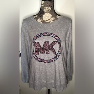 MK floral logo on long sleeve